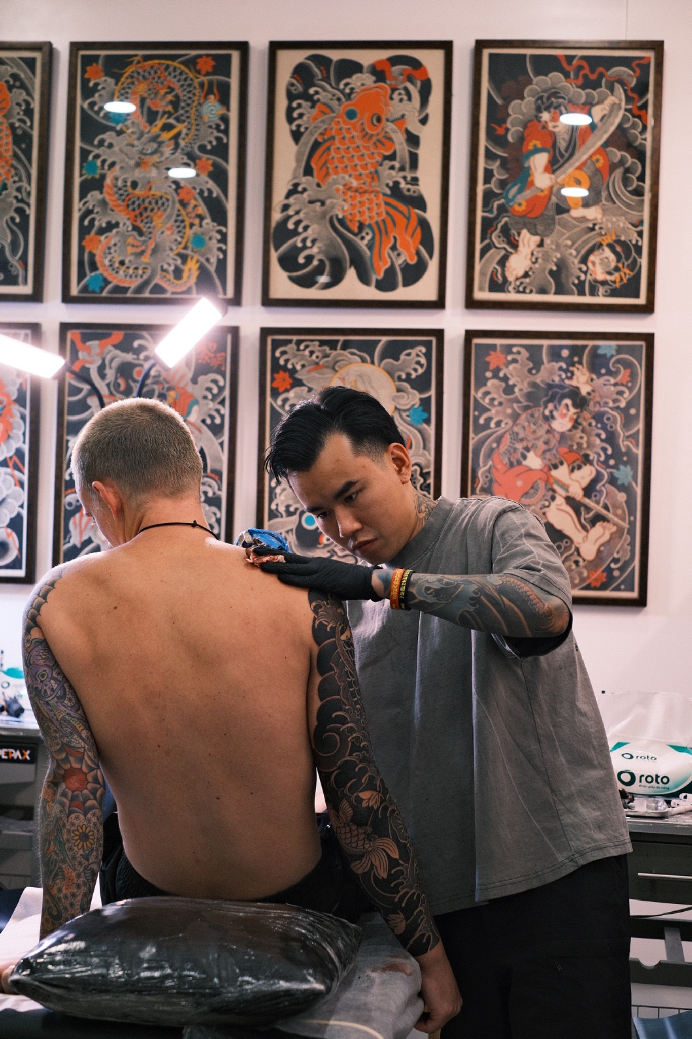 Tattooing process at SAIGON NEEDLE